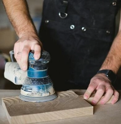 Orbital sander power tool in use